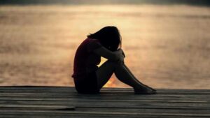 Explore the causes and symptoms of depression in teenagers