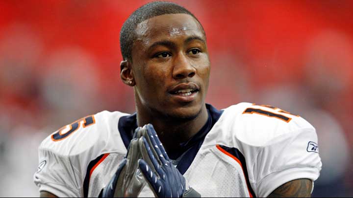 Brandon Marshall on the playfield, wearing his football team uniform, symbolizing his journey of overcoming challenges associated with Personality Disorders.