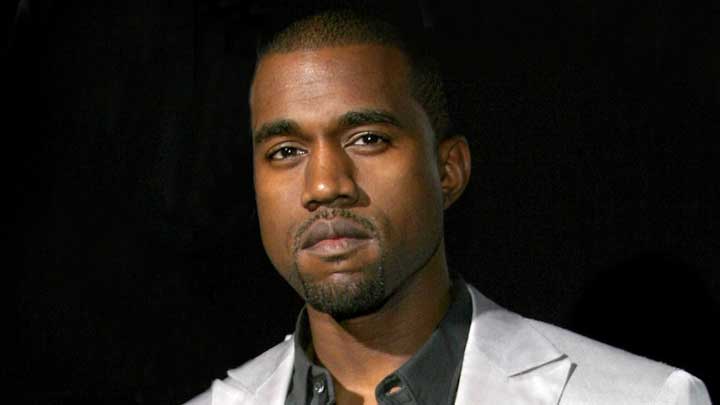 Kanye West looking directly into the camera, reflecting intensity and his journey with emotional challenges linked to Intermittent Explosive Disorder (IED).