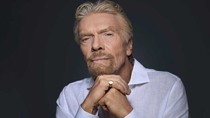 Richard Branson in a thoughtful pose, symbolizing his innovative mindset and resilience in managing ADHD.