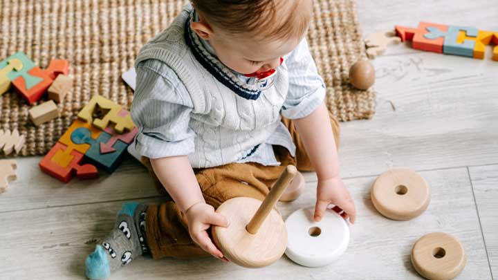 Explore why sharing is challenging for toddlers and find practical tips to teach them empathy and cooperation through positive reinforcement and play.